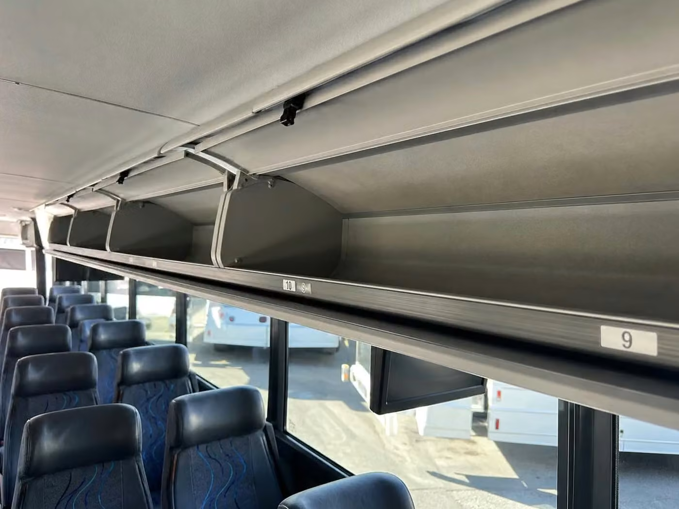 san gabriel 56 passenger charter bus overhead storage